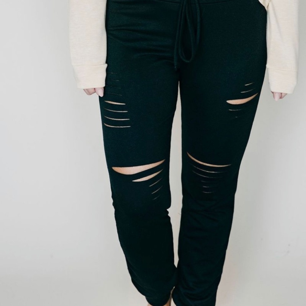 Black distressed joggers.